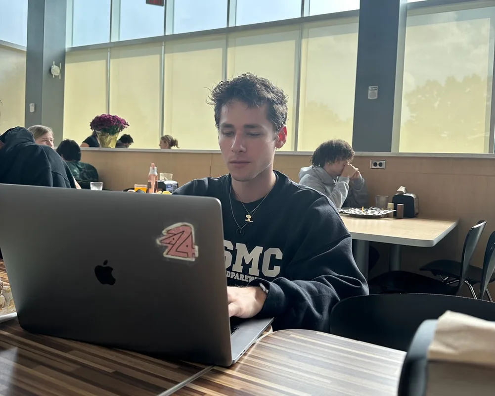 Ryan Skees' working at a table